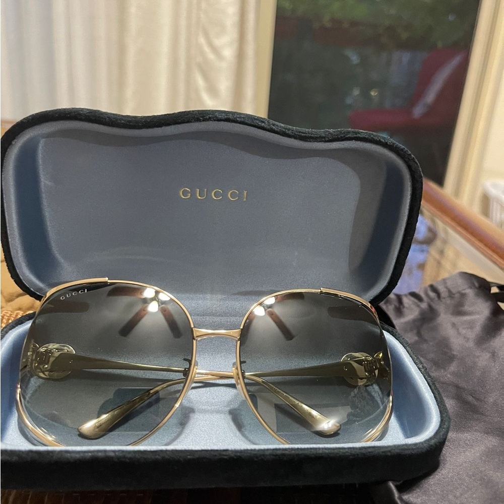 Gucci Women's Sunglasses with Gold Frame and Gray Lenses